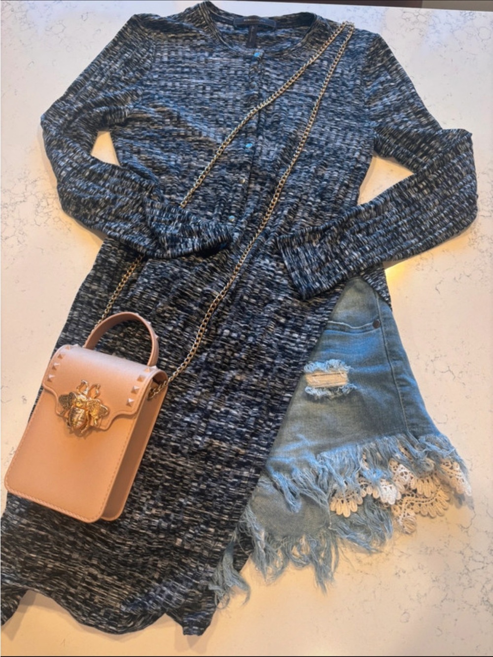 BCBGMaxAzria designer Navy and White Textured Knit Top with waist-high slit